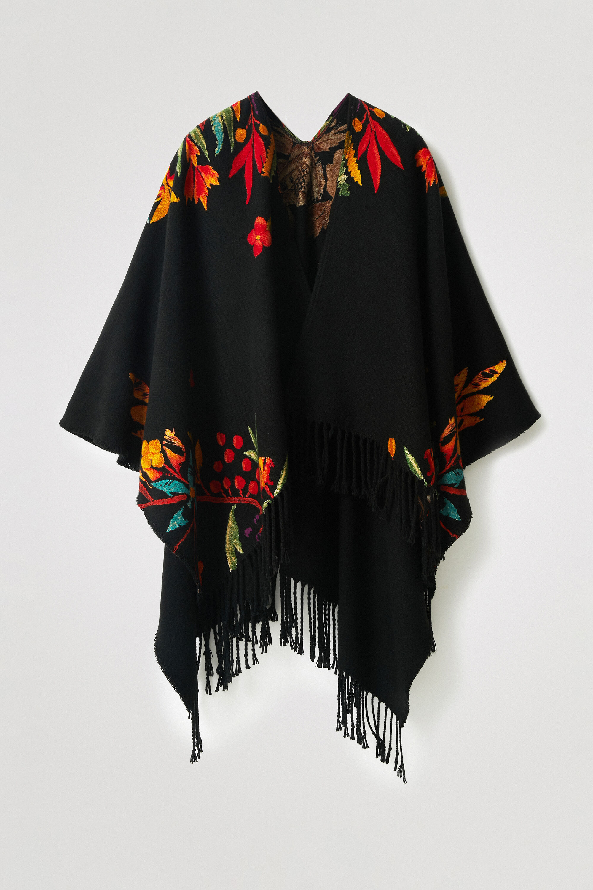 Poncho floreale frange