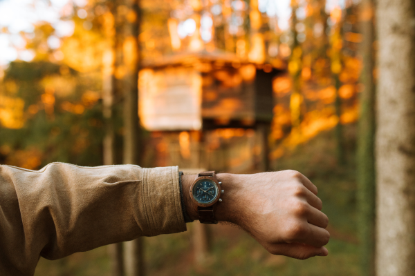 Man showing a watch. 