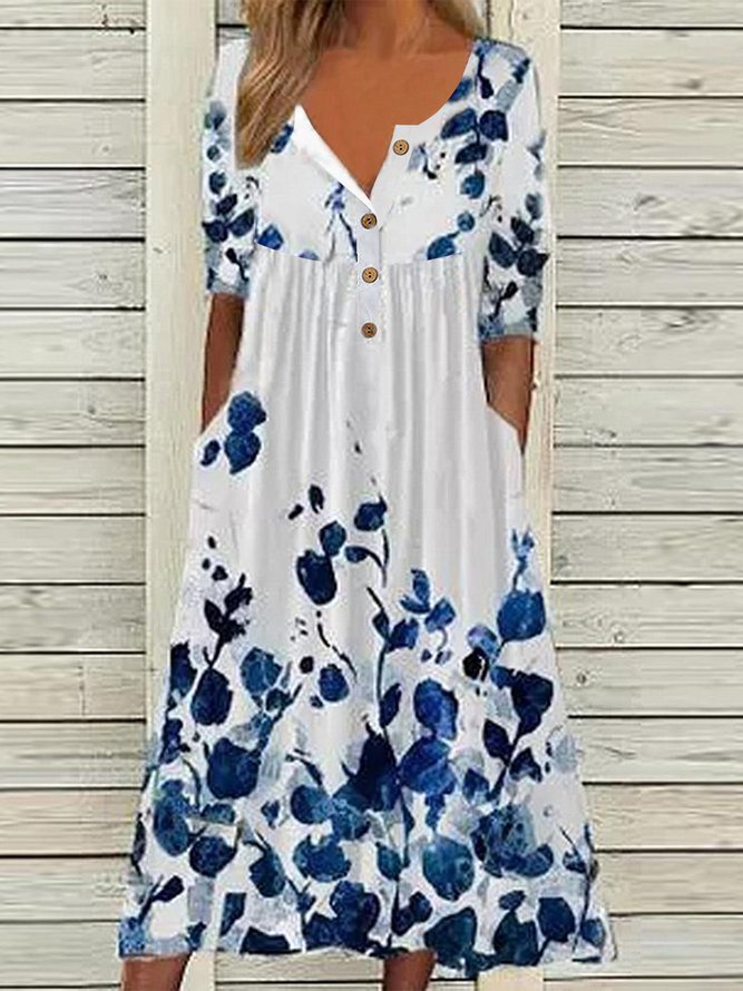  Buttoned Floral Loosen Dress...