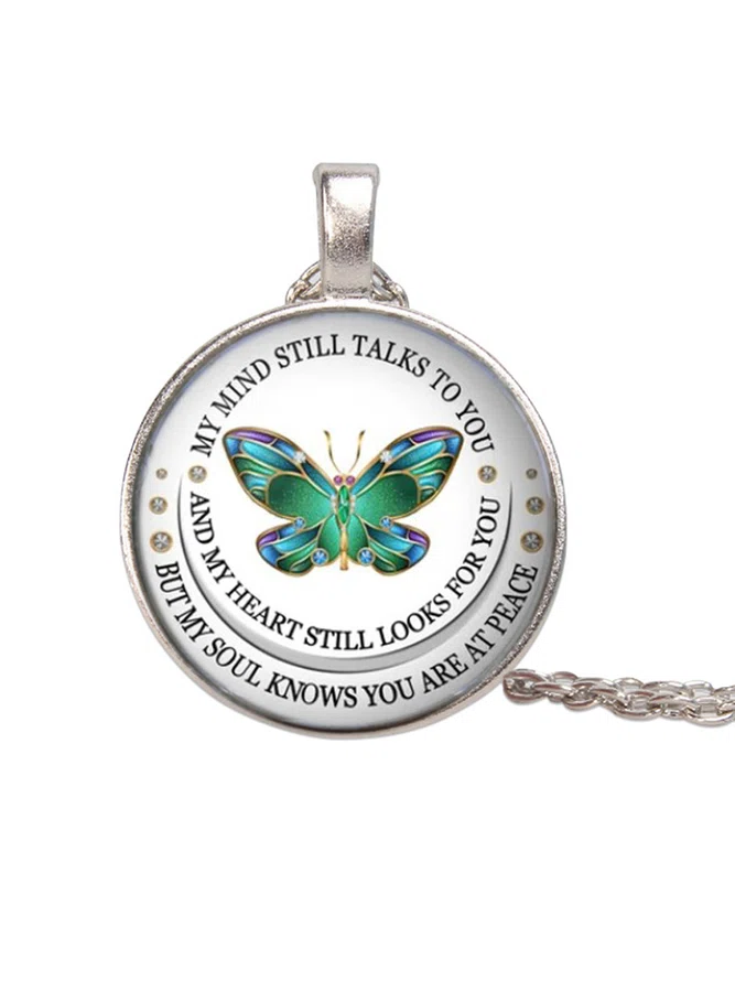Time Stone Butterfly Necklace...