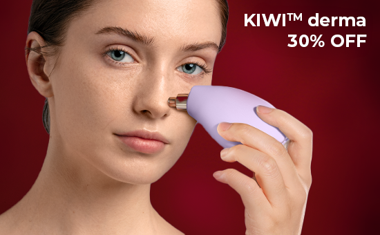 A woman using a KIWI derma device