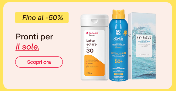 Tre prodotti solari su sfondo giallo: Latte solare Redcare SPF 30, spray solare Defence Sun SPF 50+ e Centella Essence. Testo a sinistra: “Pronti per il sole” e badge “Fino al -50%”. Pulsante rosso “Scopri ora