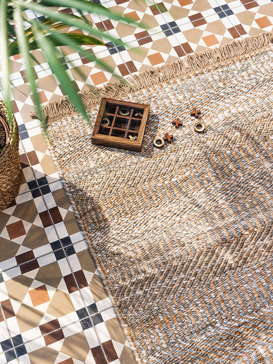 Close up on beige jute rug