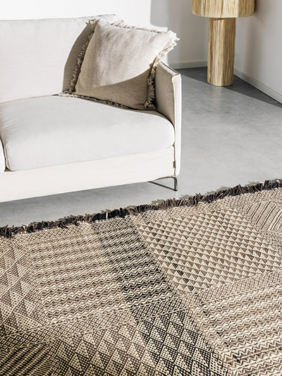 Beige kilim rug in a living room