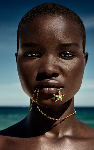 Model with starfish charm
