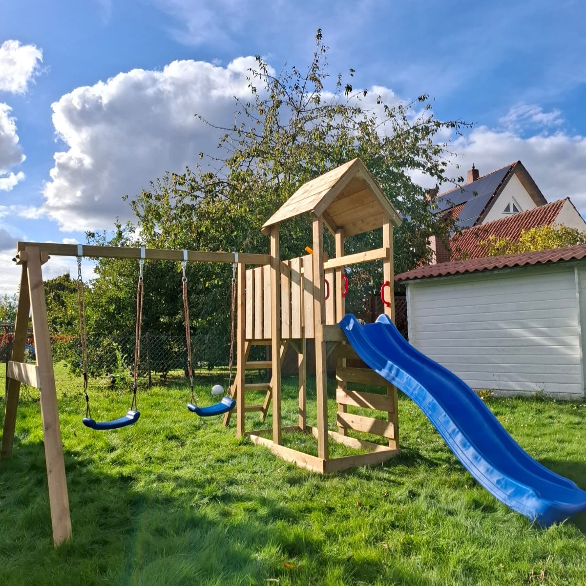 Parco giochi Wickey MultiFlyer con tetto in legno
