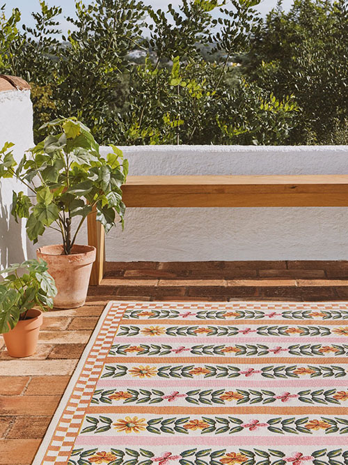 Colourful outdoor rug on terrace
