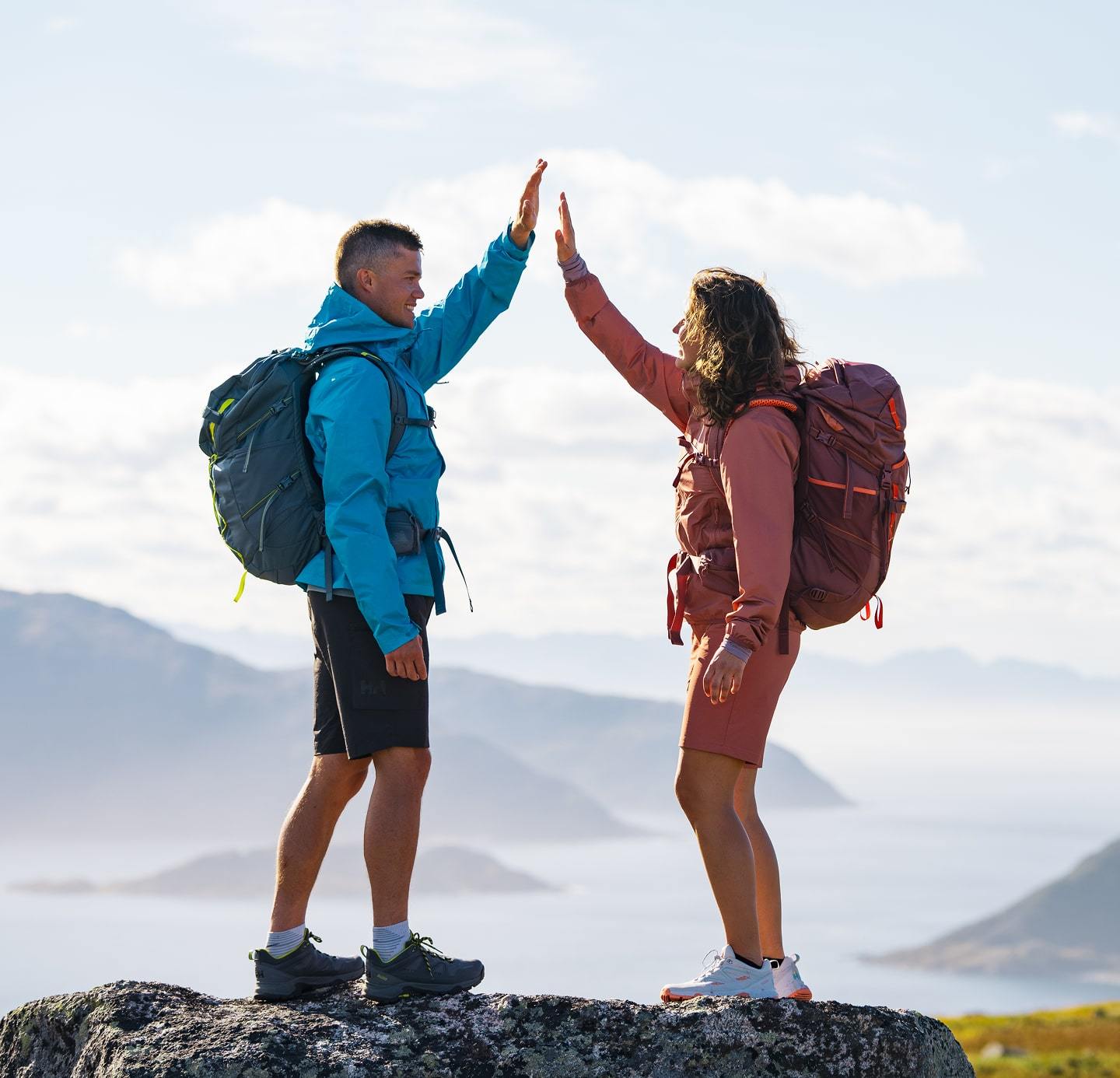 Couple hiking in Helly Hansen backpacks