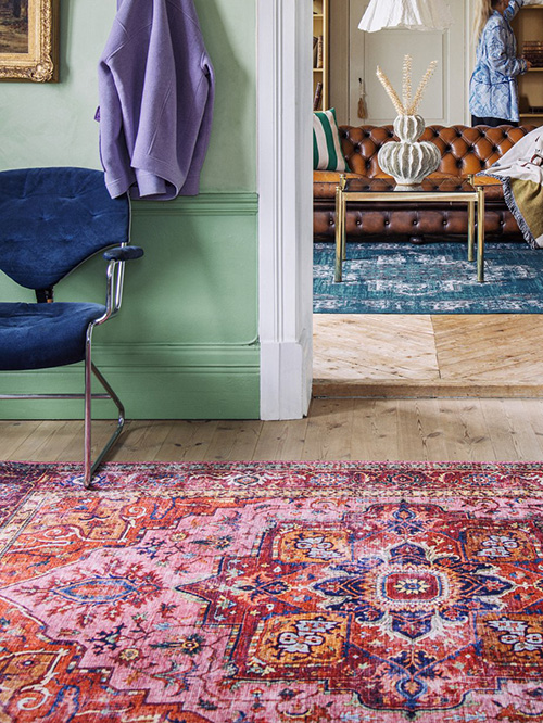 Two oriental rugs in a living room