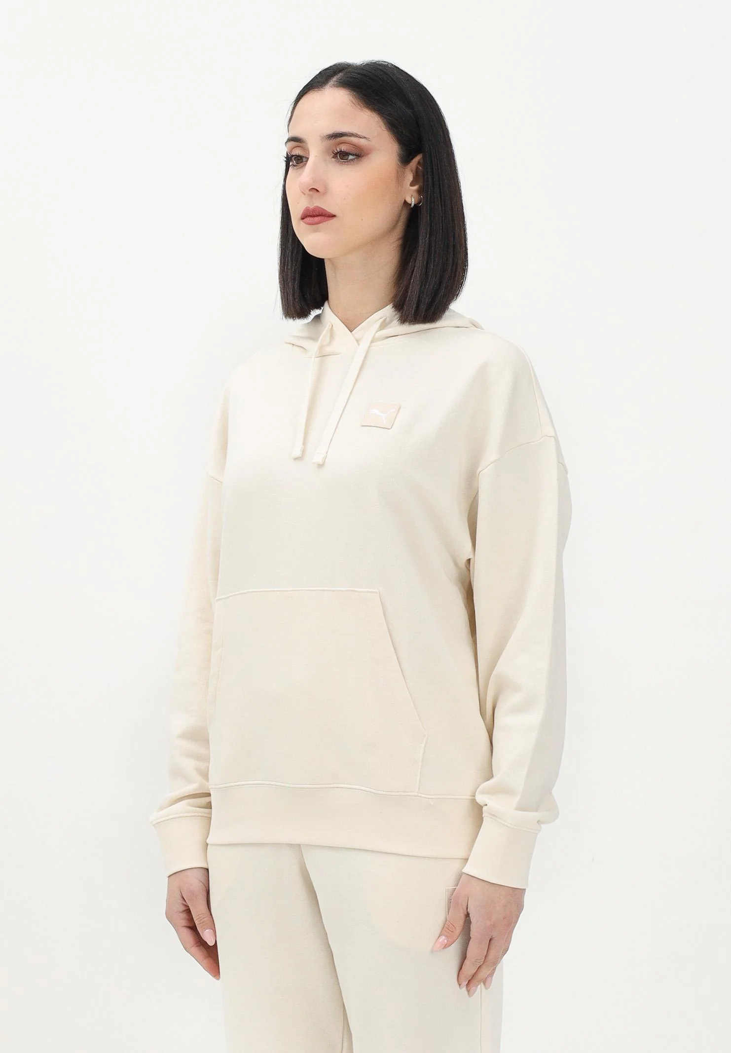 Image of PUMA Felpa con cappuccio Ess Elevated panna da donna