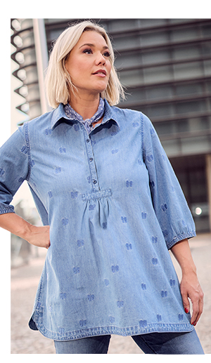 Blusa con fiocchi ricamati, collo da camicia e maniche a 3/4