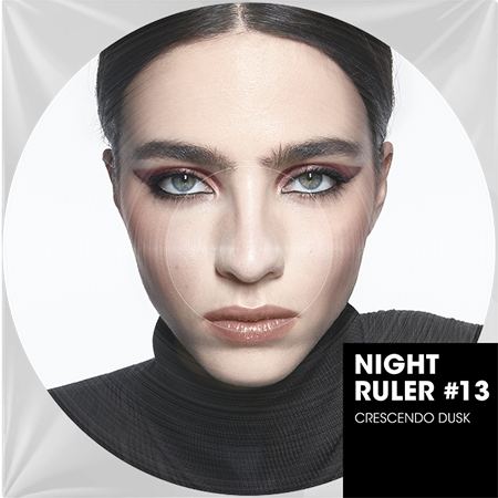 Close-up of a model wearing intense, dark reddish-brown winged eyeshadow with a hint of inner corner shimmer, defined eyebrows, and natural glossy lips, showcasing the YSL Beauté 'Night Ruler #13 Crescendo Dusk' look.