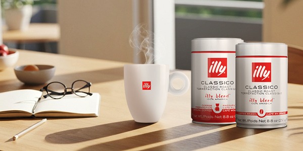 illy whole bean Classico and Intenso cans on a counter
