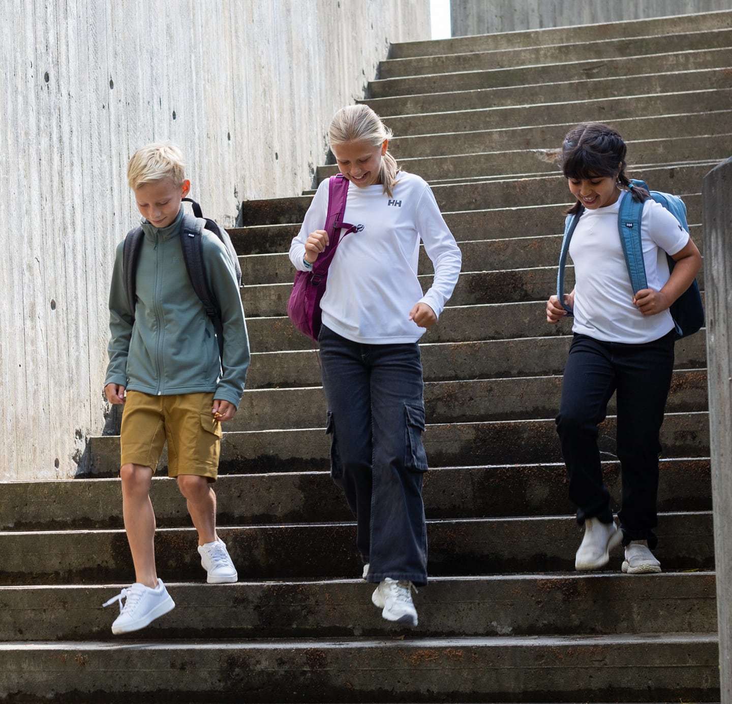 Kids on their way to school, wearing Helly Hansen gear