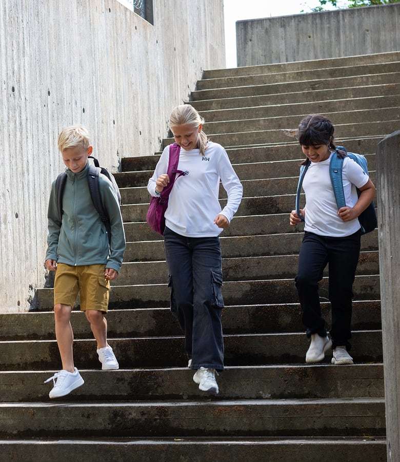 Kids on their way to school, wearing Helly Hansen gear