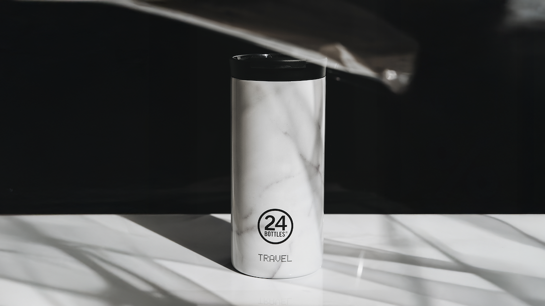  Carrara Travel Tumbler stands at the centre.