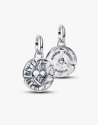 Front and back of flaming heart Pandora Talisman