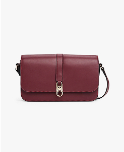 Borsa a tracolla con patta e monogramma TH