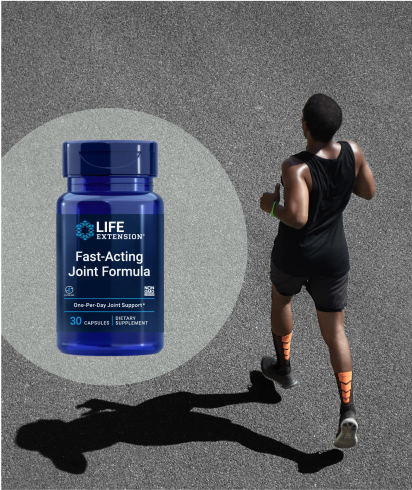 alt="Bottle of Life Extension Super Ubiquinol CoQ10 versando capsule softgel rosse su un piccolo piatto su una superficie ruvida»
