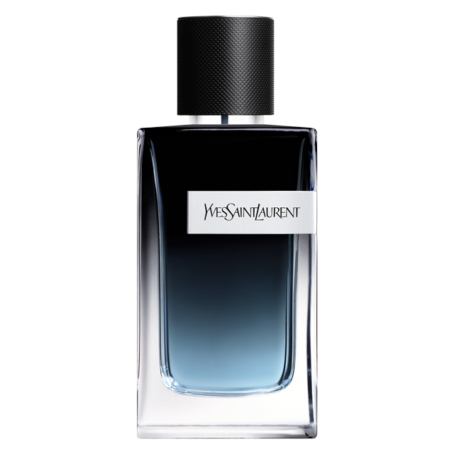 Una bottiglia di colonia con sfumatura dal blu scuro al nero, forse "Y" di YSL, con un tappo argentato. È in piedi su una superficie bianca.