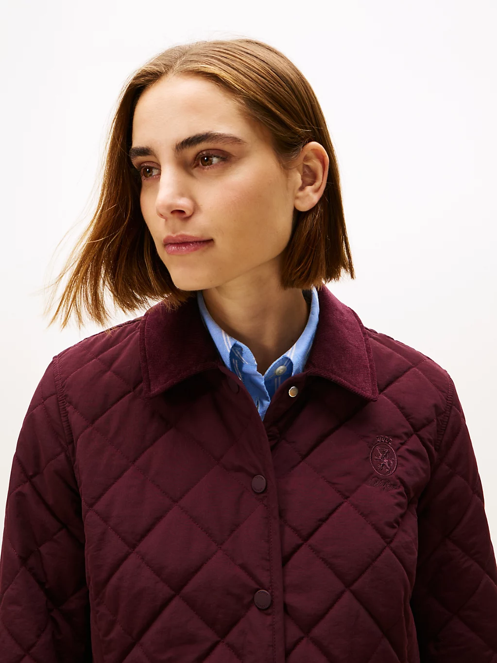 Giubbino slim fit imbottito con stemma