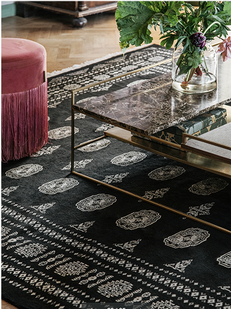 Black rug in a living room