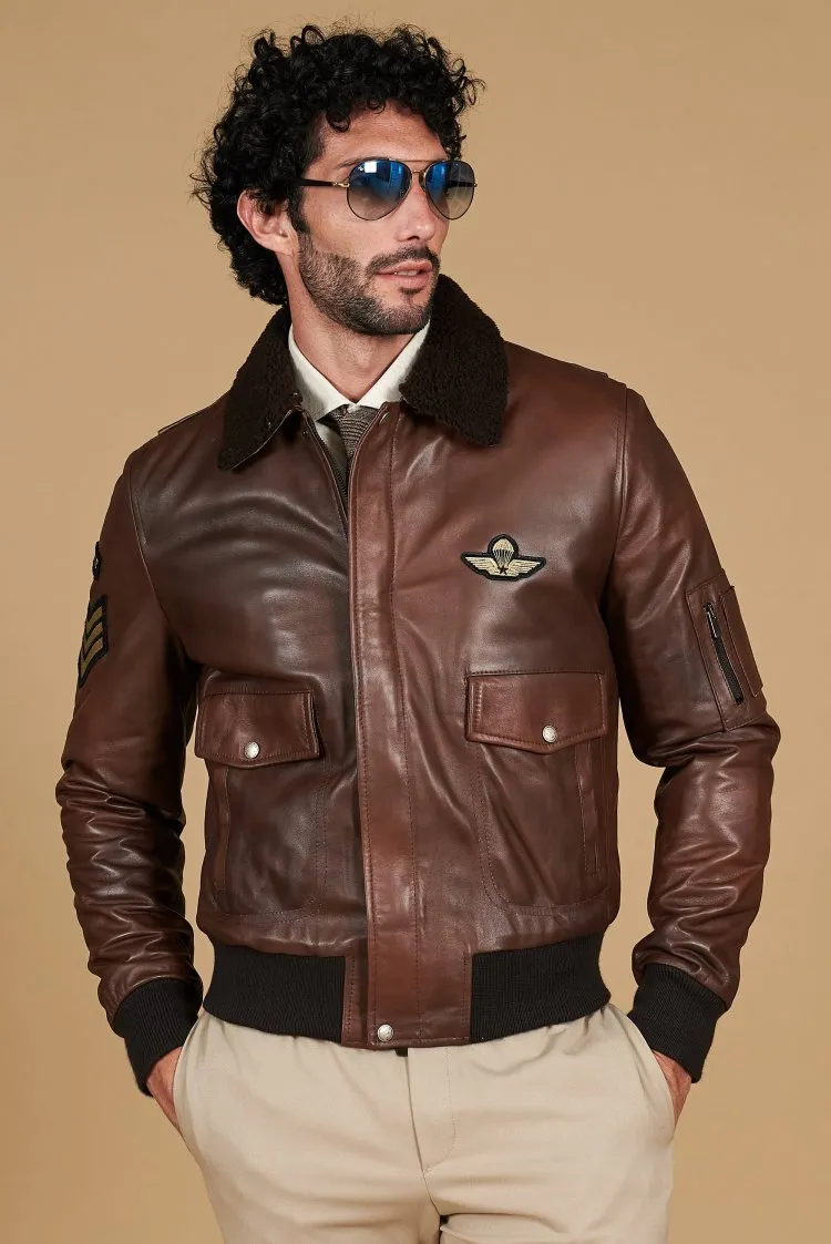 Image of Giubbotto aviatore in pelle marrone collo montone a tono