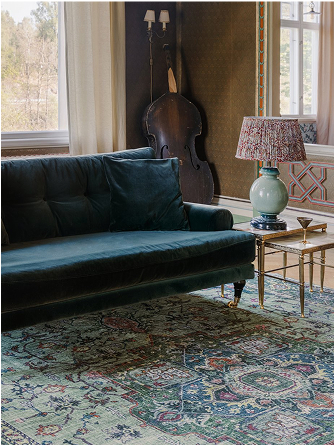 Green oriental rug in a living room