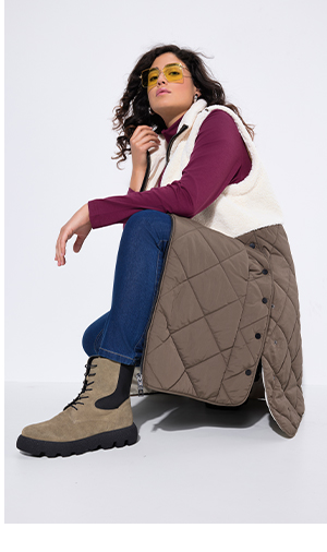 Gilet lungo con pile teddy, trapuntatura e bottoni automatici laterali