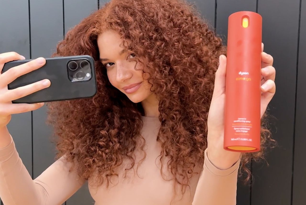 A range of models with different hair types nourished using Dyson Omega products.