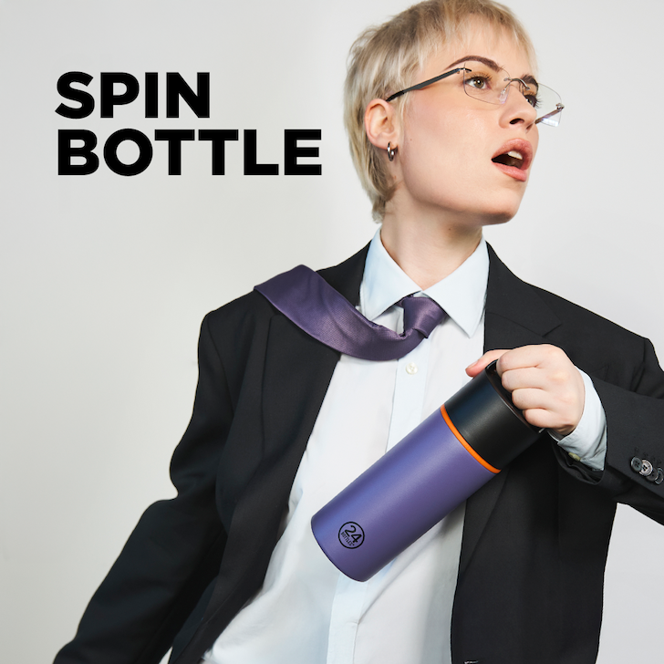 In the foreground stands Spin Bottle