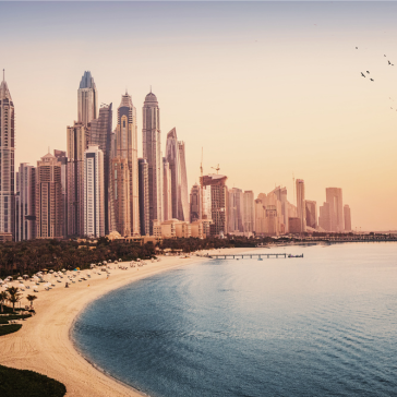 View of Dubai’s skyline at sunset – modern architecture meets oriental charm.