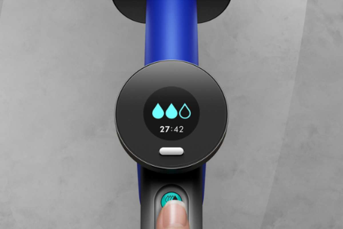 A close-up of the Dyson WashG1's LCD screen hydration icons.