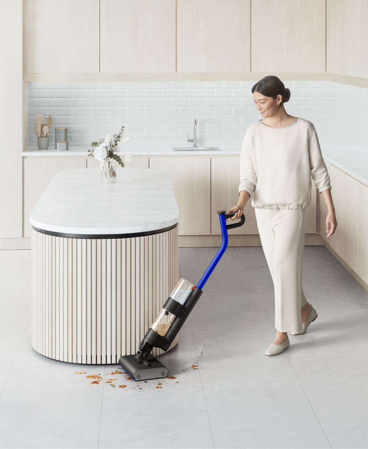 Side and front-on view of the Dyson Wash G 1 wet cleaner.