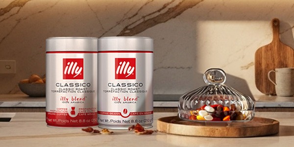 illy whole bean Classico and Intenso cans on a counter