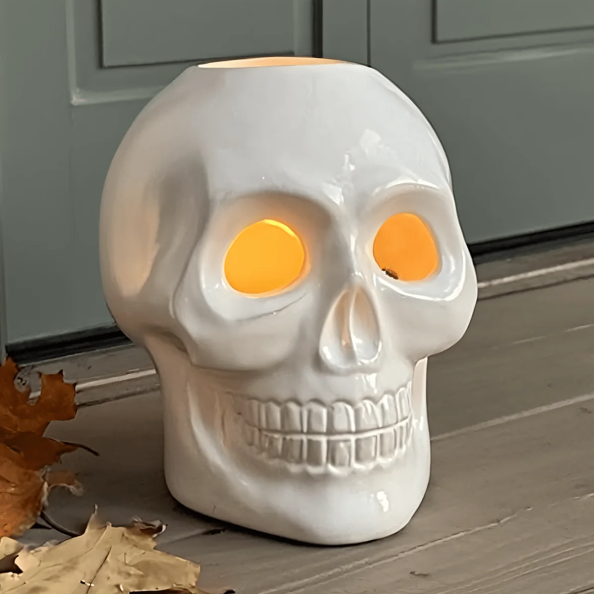 Ceramic skull LED candle holder - 17 cm