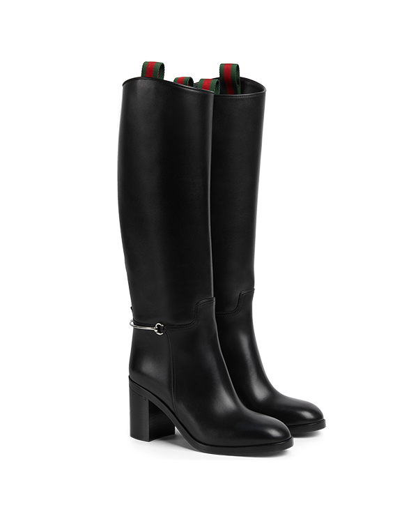 Capo di abbigliamento Scopri di più sul sito Web di Gucci 