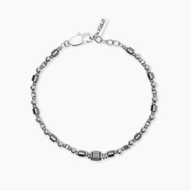 STYLE 27  Bracciale con elemento centrale a strisce, cilindri e cubetti faccettati in ematite