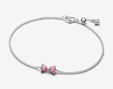 Bow sterling silver bracelet with fancy pink and clear cubic zirconia