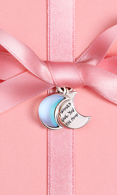 Pandora crescent moon charm with an engraved message