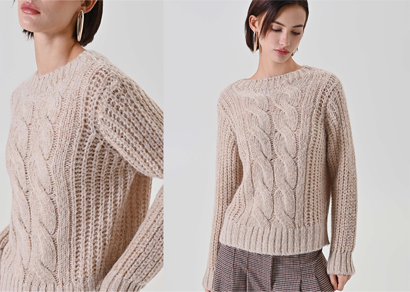 Maglia panna con lavorazione a trecce