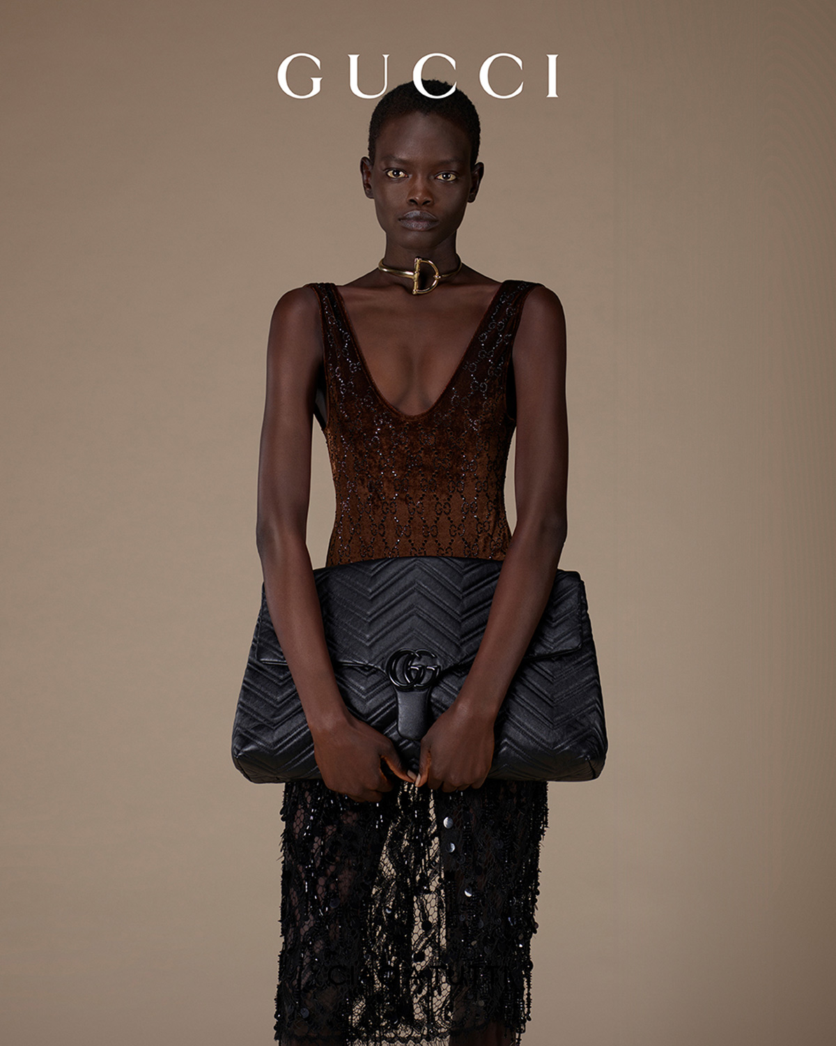 Capo di abbigliamento Scopri di più sul sito Web di Gucci 