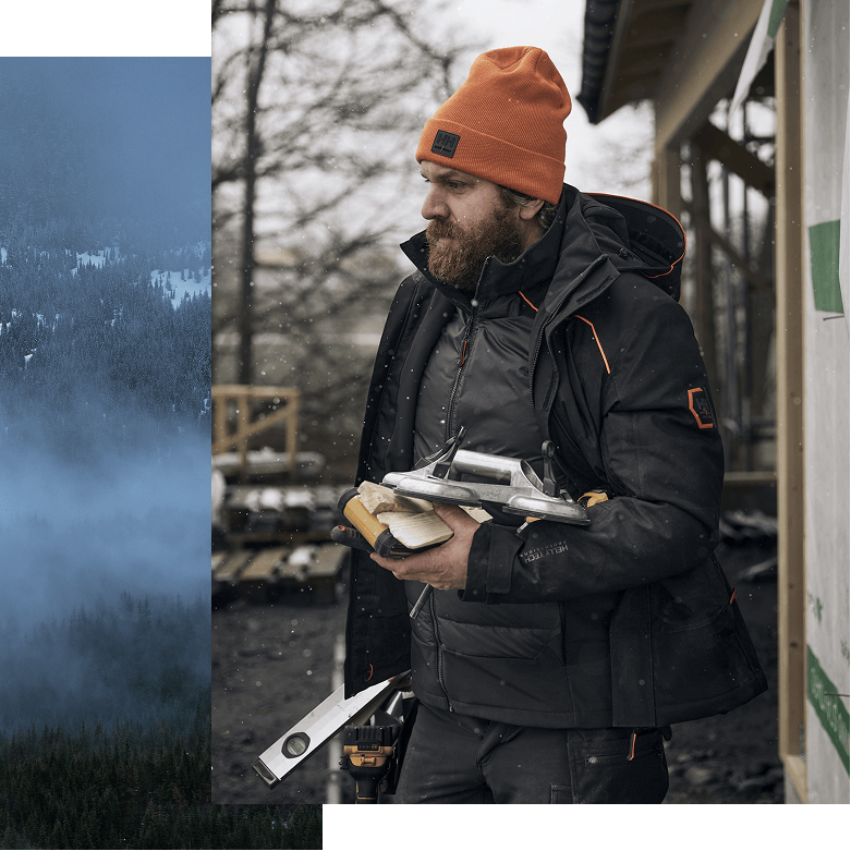 Man on construction site in Workwear jacket