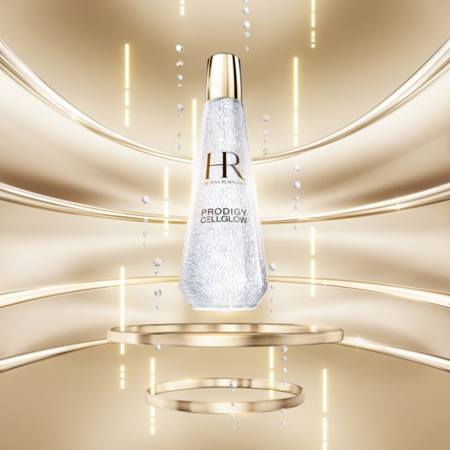 Flacone dell'essenza Dewy fluttuante su cerchi dorati