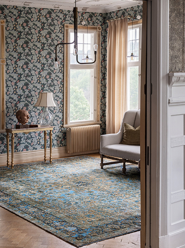 Classic blue rug in a blue living room