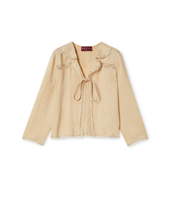 Capo di abbigliamento Scopri di più sul sito Web di Gucci 