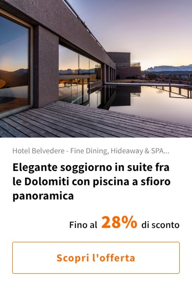 Elegante soggiorno in suite fra le Dolomiti con piscina a sfioro panoramica
