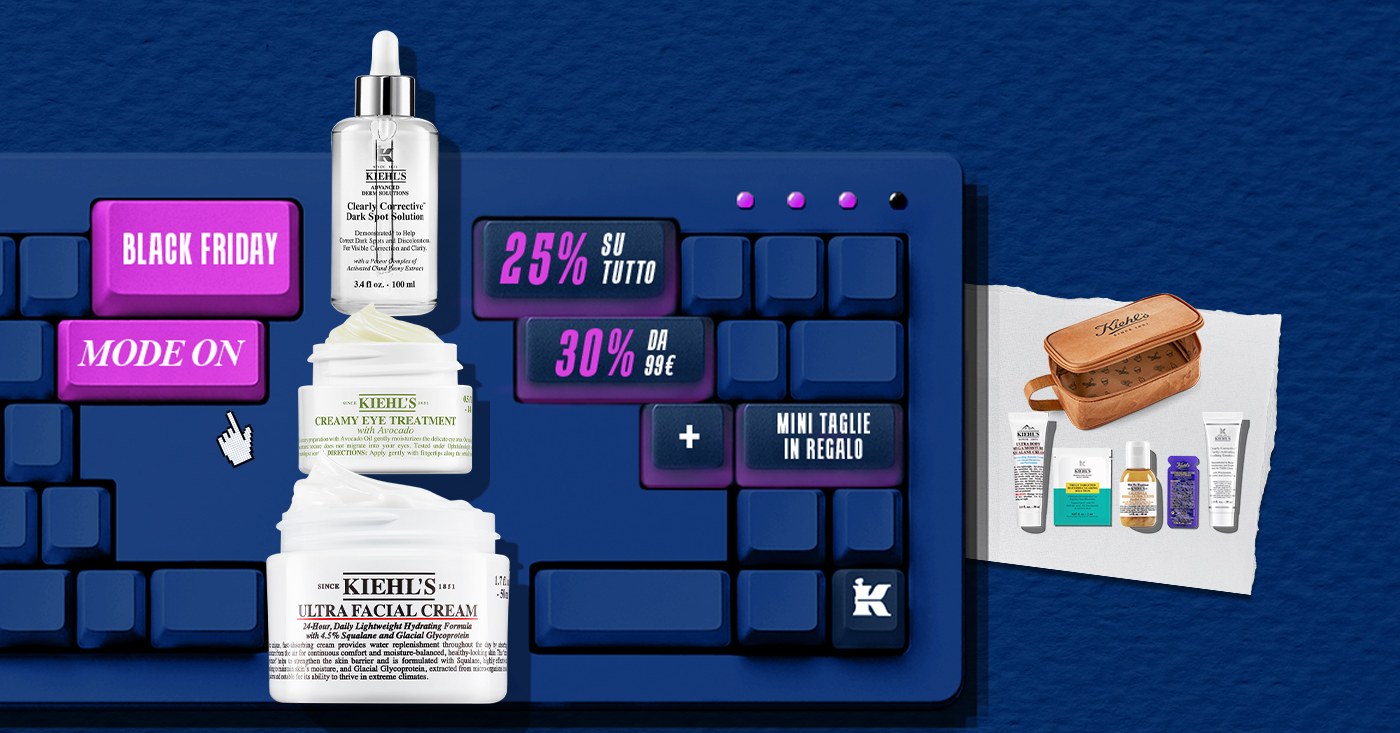 Immagine promozionale Kiehl’s per il Black Friday: tastiera blu con tasti rosa e viola che mostrano le scritte “Black Friday”, “25% su tutto”, “30% da 99€” e “mini taglie in regalo”. In primo piano i prodotti Kiehl’s Ultra Facial Cream, Creamy Eye Treatment con Avocado e Clearly Corrective Dark Spot Solution. A destra un set di mini taglie e un beauty case marrone. Questa immagine porta alla sezione promozionale del Black Friday Kiehl’s.