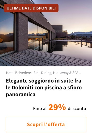 Elegante soggiorno in suite fra le Dolomiti con piscina a sfioro panoramica