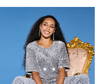 Maglia in velluto con paillettes, scollo a girocollo e mezze maniche